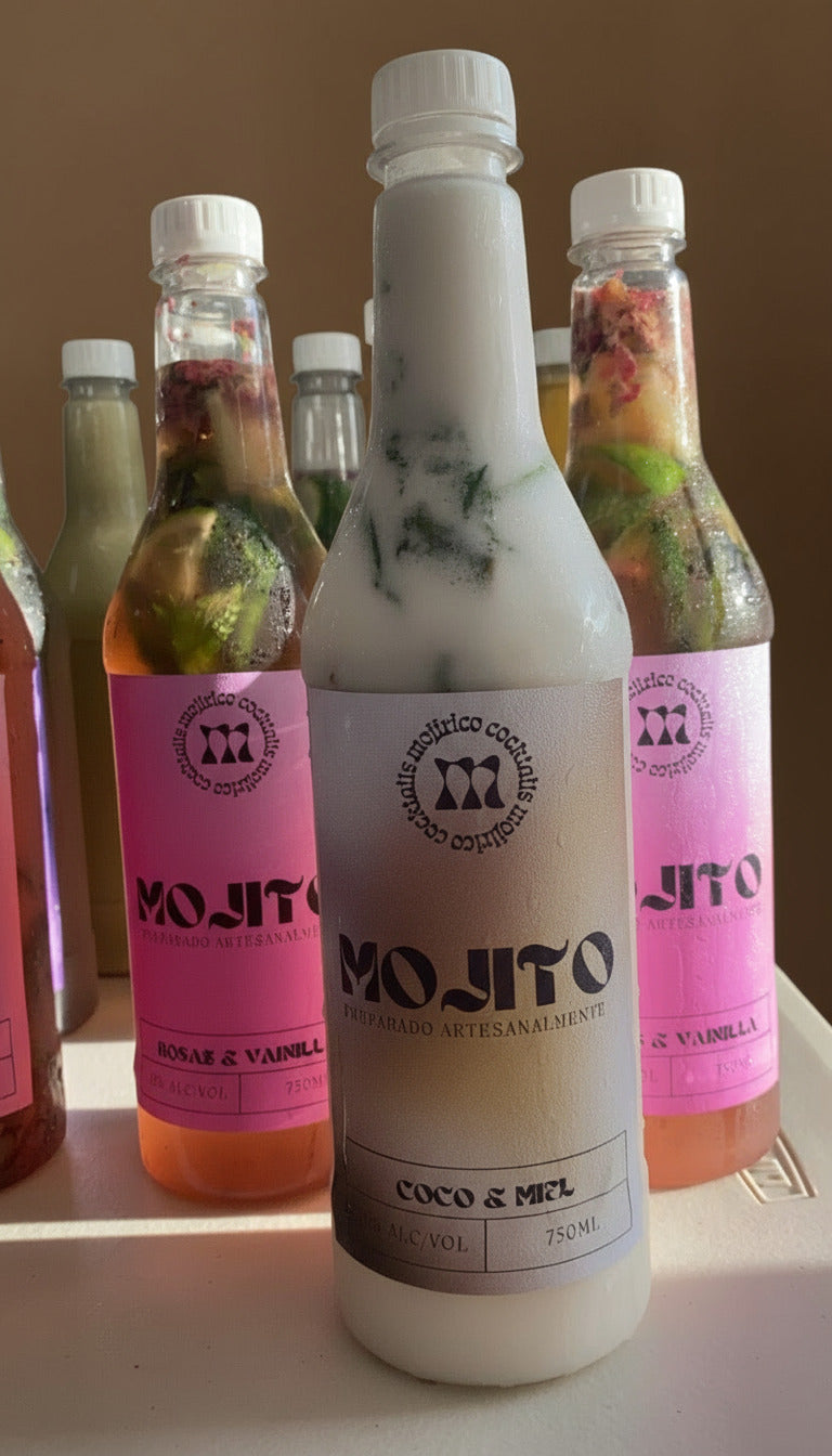 Bottles of Mojito drinks with colorful labels on a white surface.